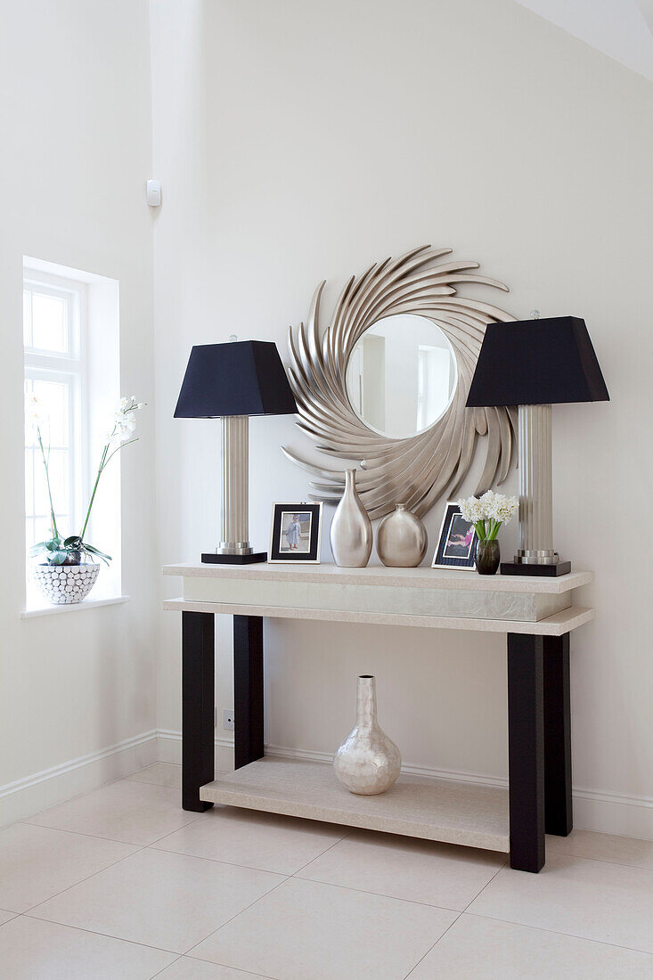 Black and white hallway of Hendon home London UK