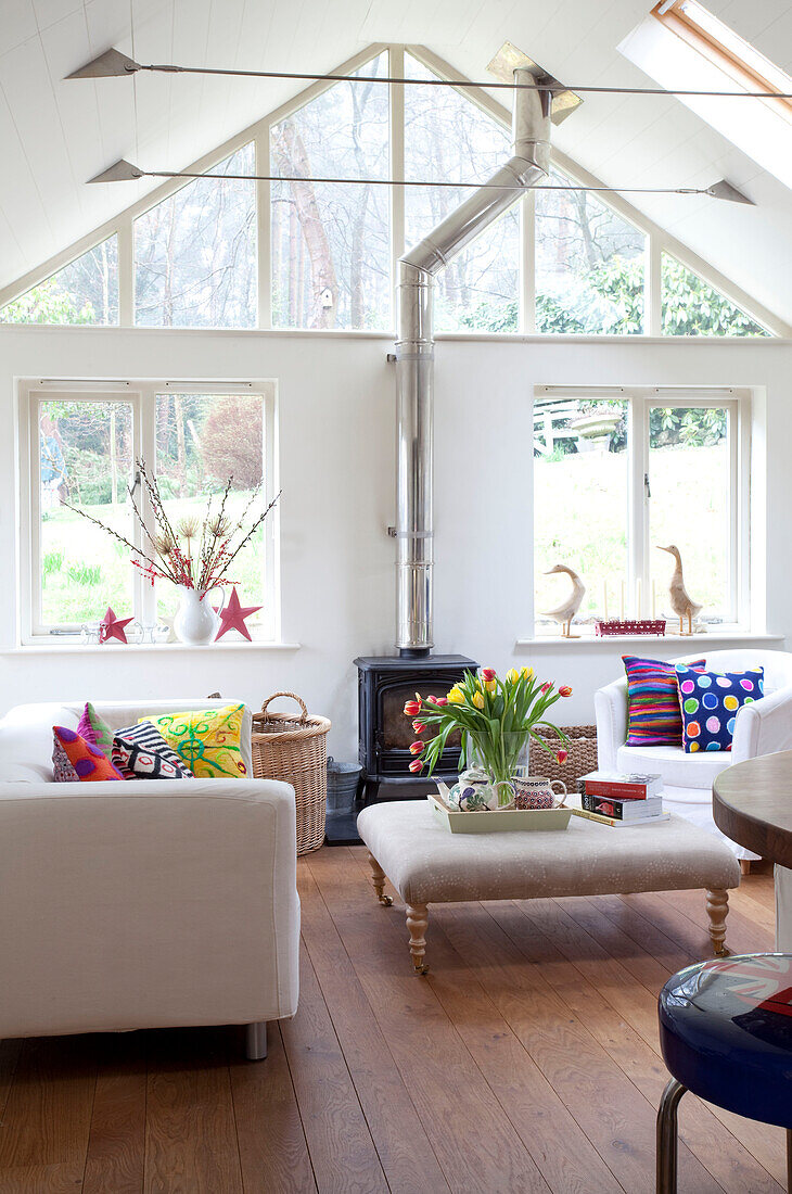 Living room with wood burner in Sussex home UK