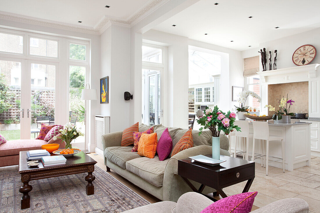 Open plan living room and kitchen with extension in contemporary London family home, UK