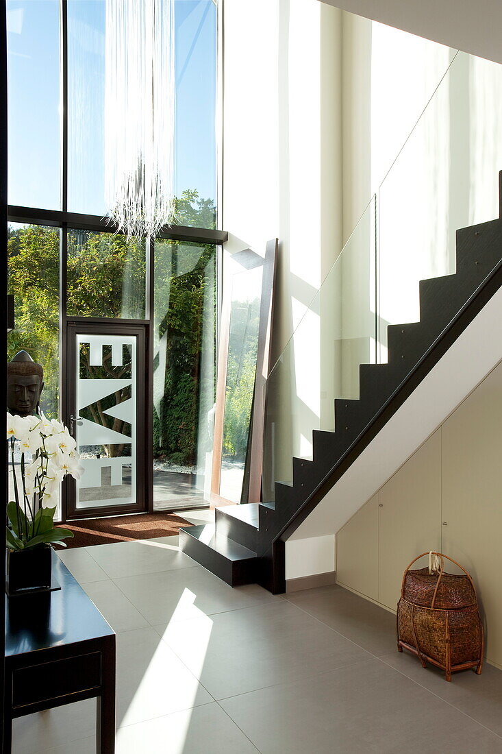 Spacious double height entrance hallway in contemporary new build, Kingston upon Thames, England, UK