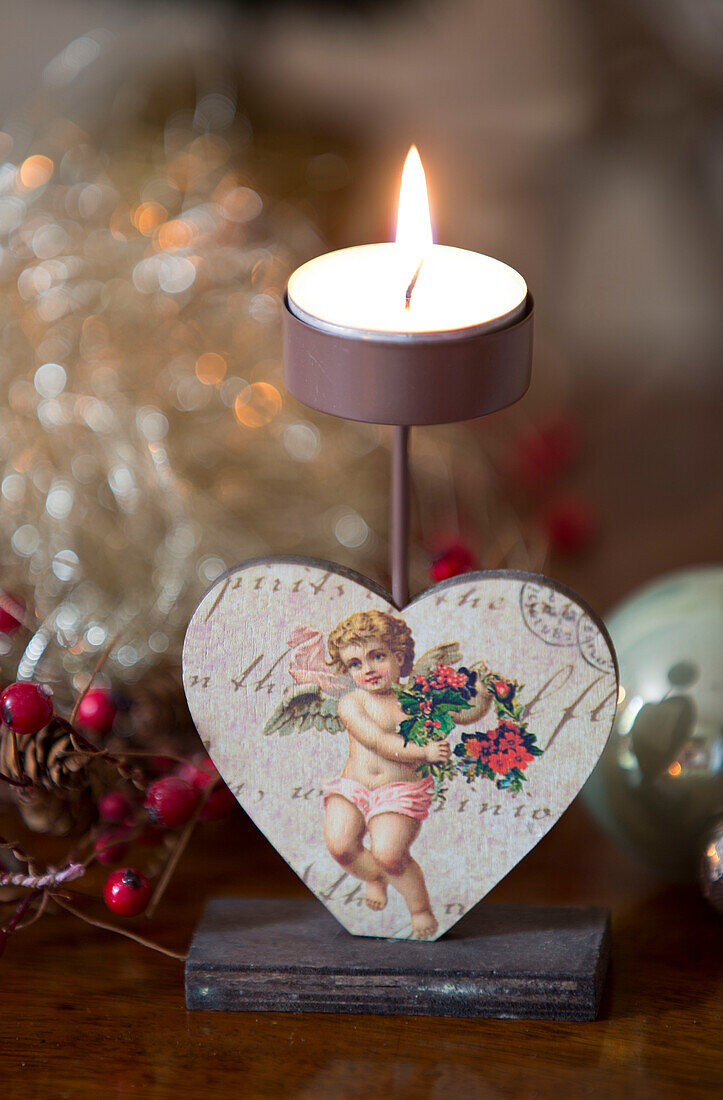 Vintage tealight holder with cherub in heart,  Berkshire home,  England,  UK