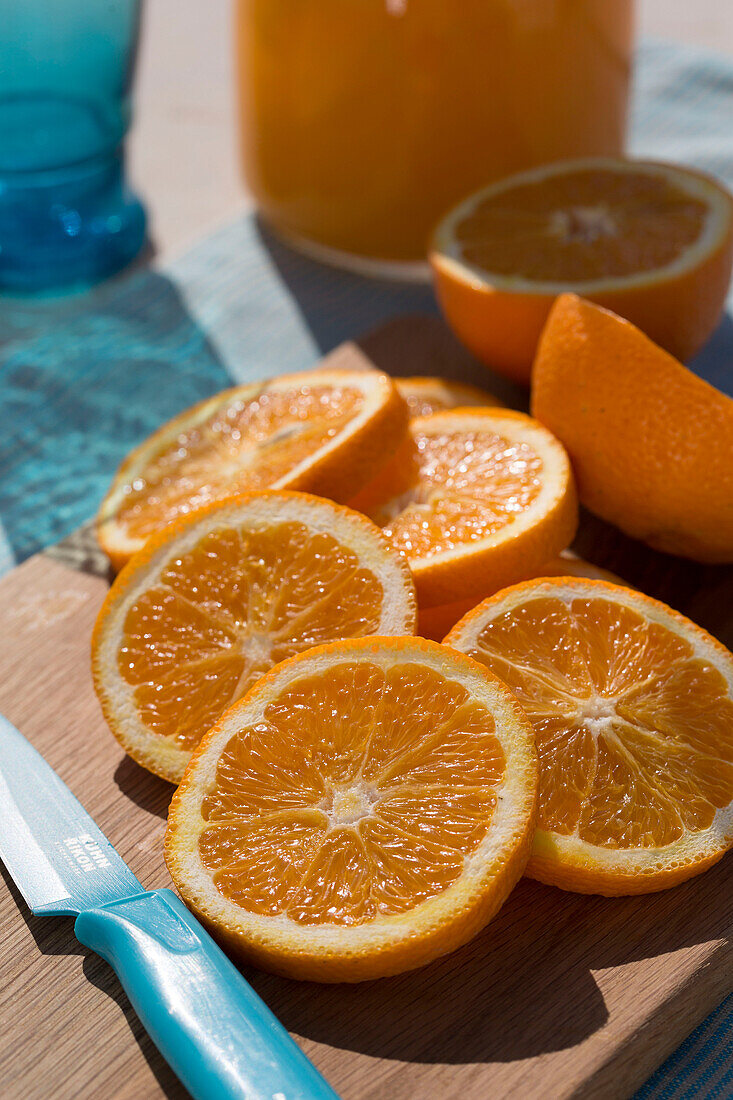 Sliced oranges in sunlight in Greek villa on island of Ithaca