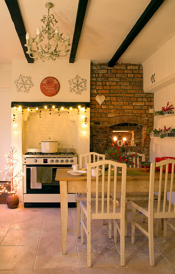 Recessed oven with kitchen table and chairs in Kent home England UK