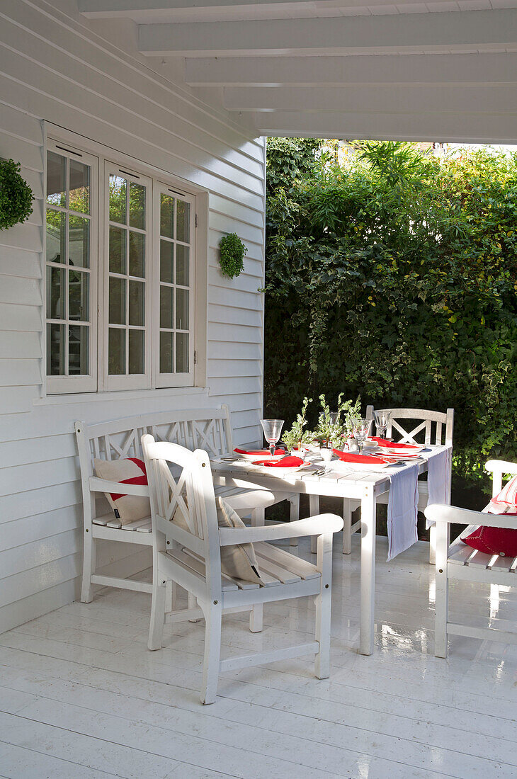 Al fresco dining on terrace of South London family home England UK