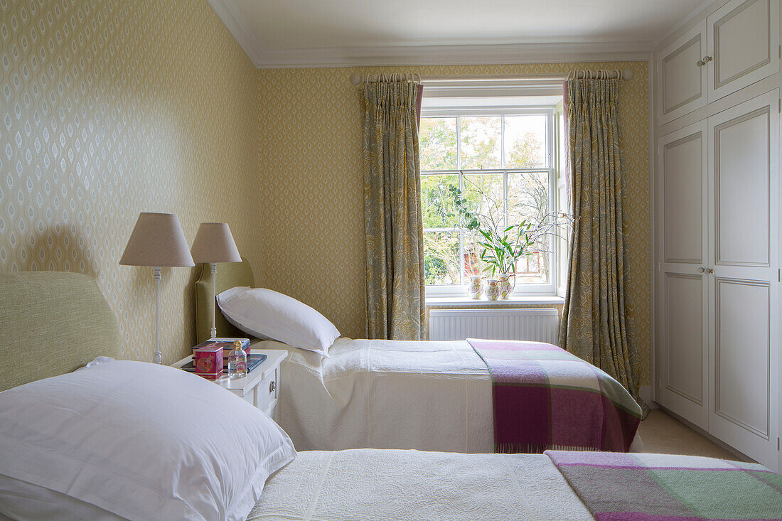 Leaf arrangement on windowsill in twin bedroom of Georgian rectory Northamptonshire England UK