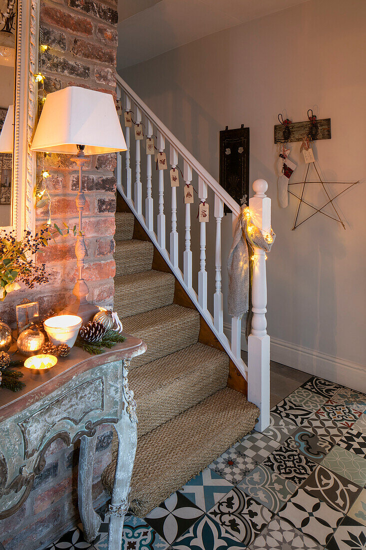 Coir matting on staircase with tiled floor in Cheshire home UK