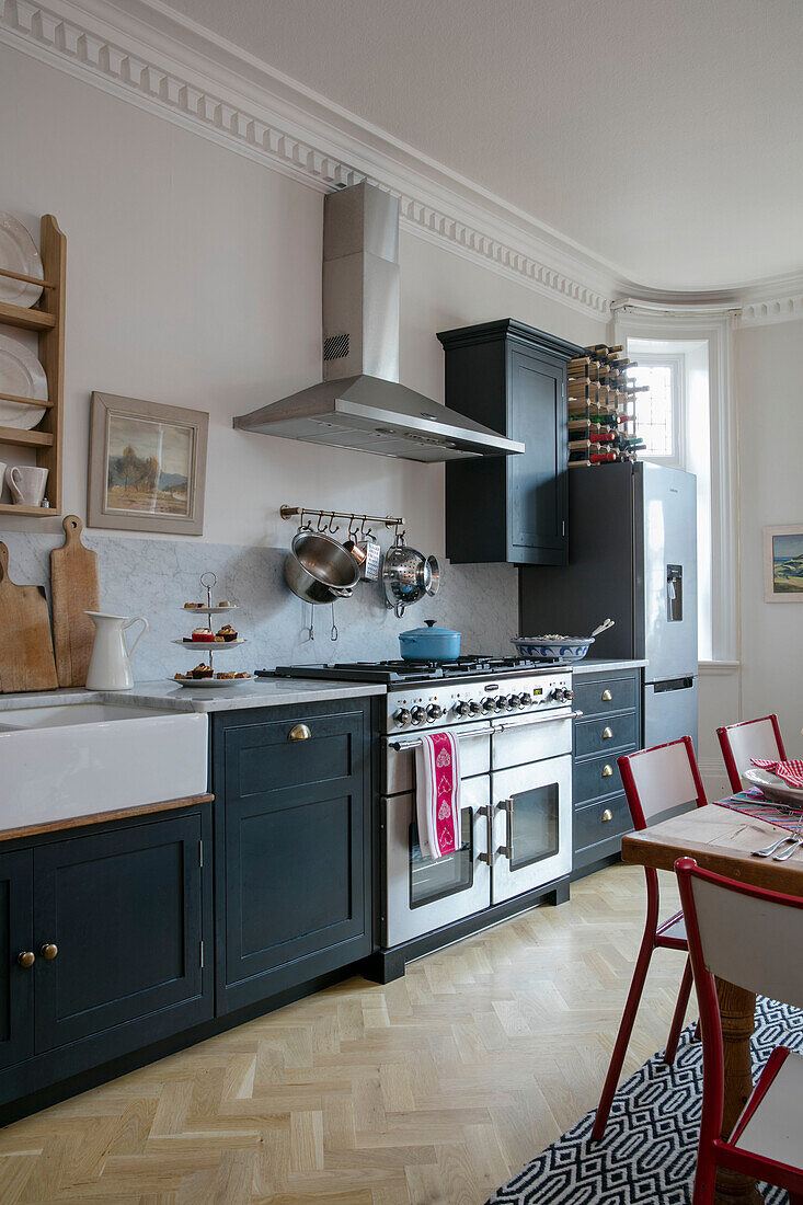 Stainless steel oven and extractor in black fitted Hove kitchen East Sussex UK