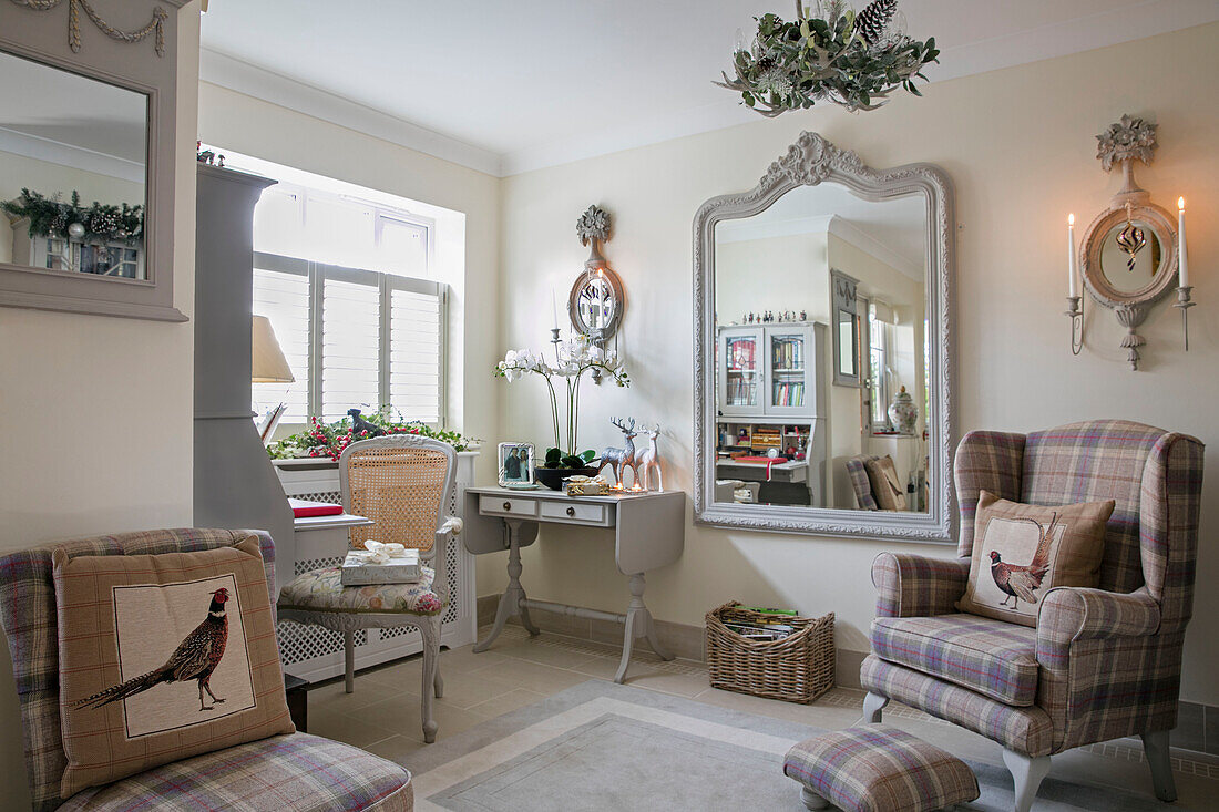 Large antique mirror with chairs in Mulberry fabric and walls in Bone Grey Herefordshire newbuild UK