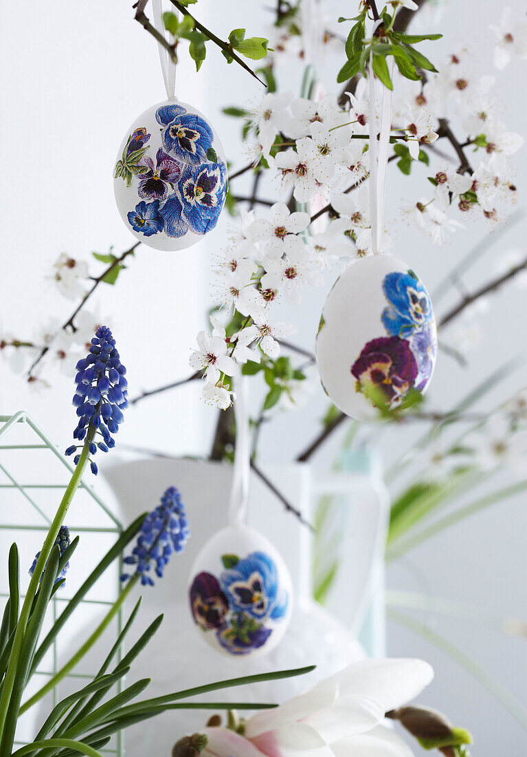 Easter eggs on blossom branches detail