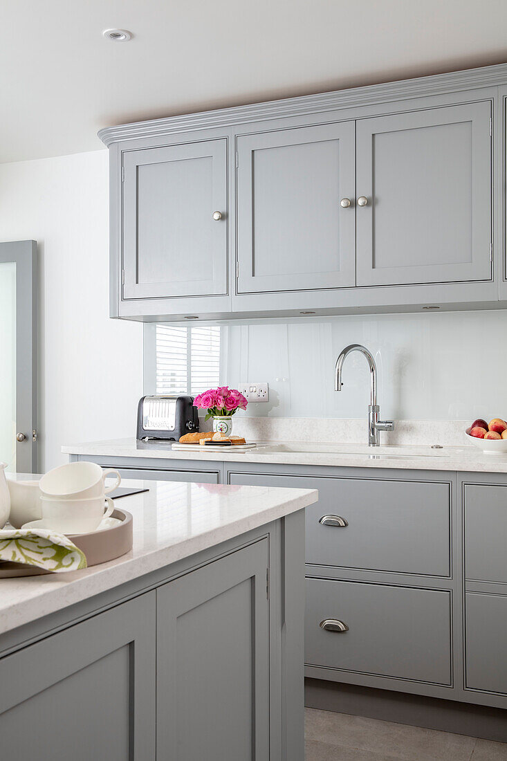 Grey kitchen units and sink London UK