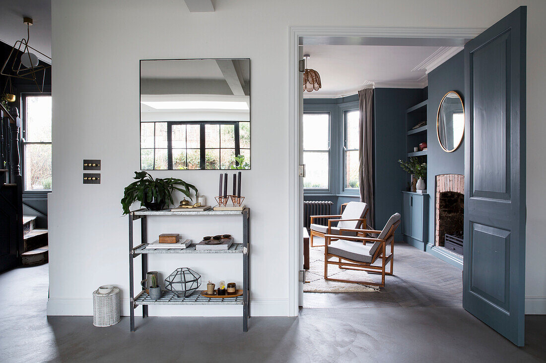 Modern living room in grey and blue tones