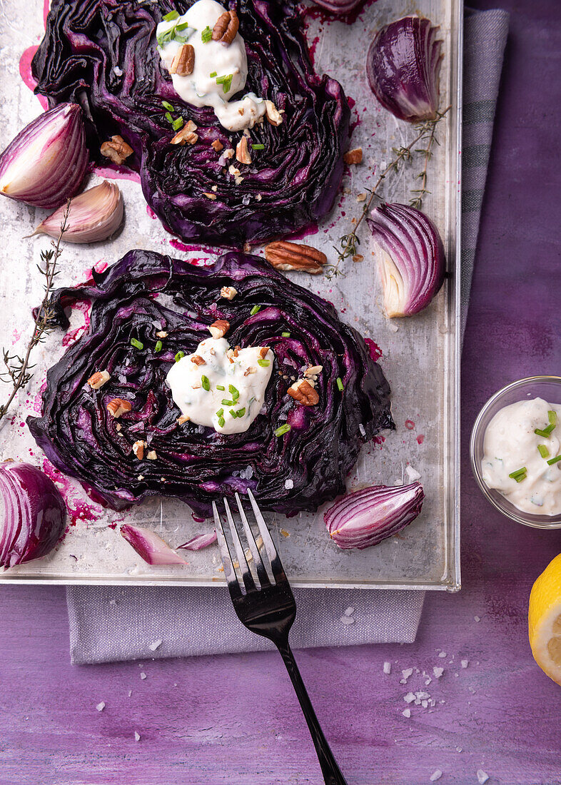 Oven-baked red cabbage with herb soy curd and pecans