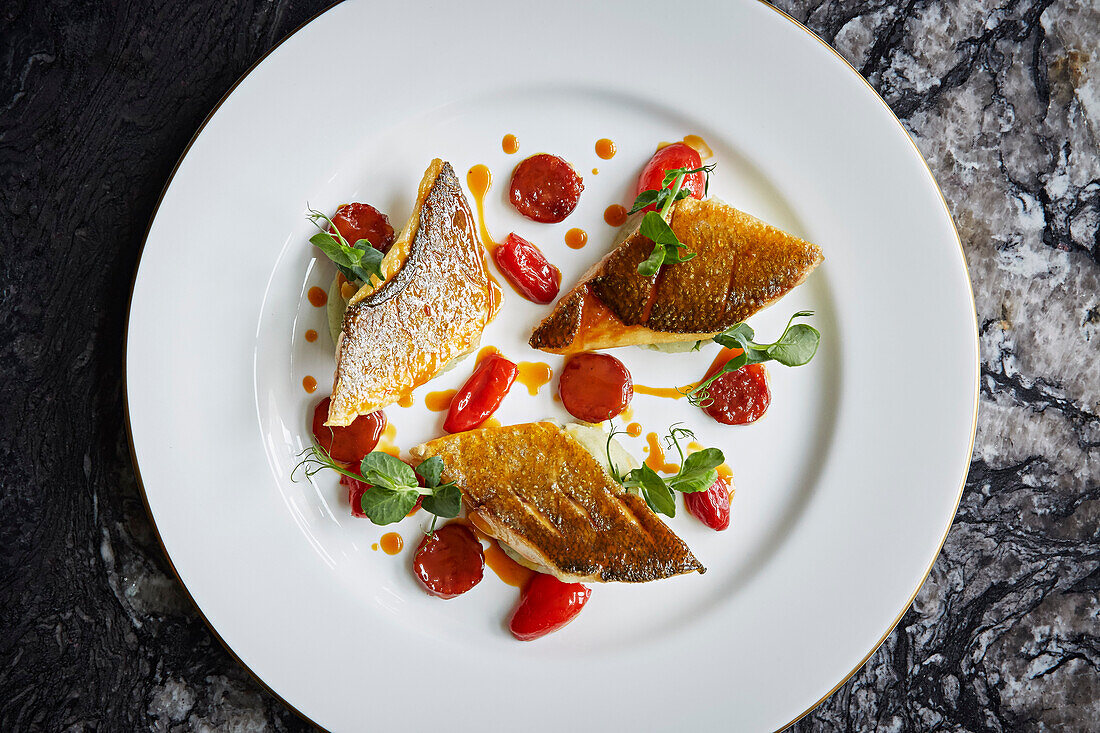 Hake and chorizo with red peppers