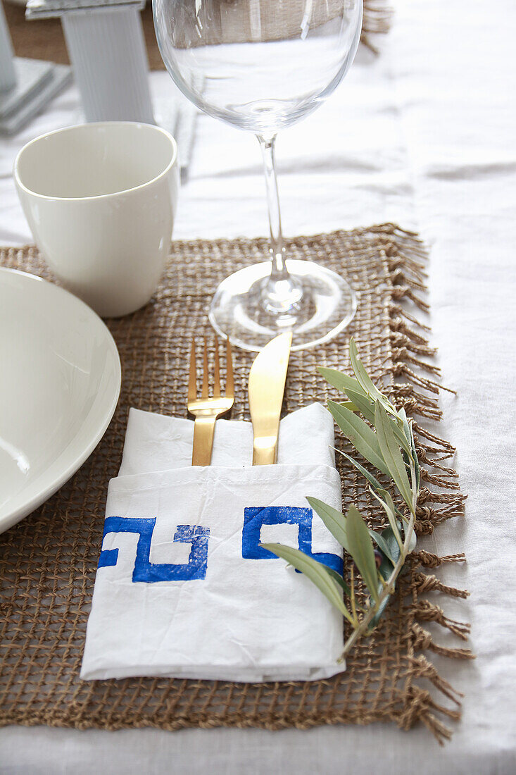 DIY napkin with potato print on summer table in Grecian style