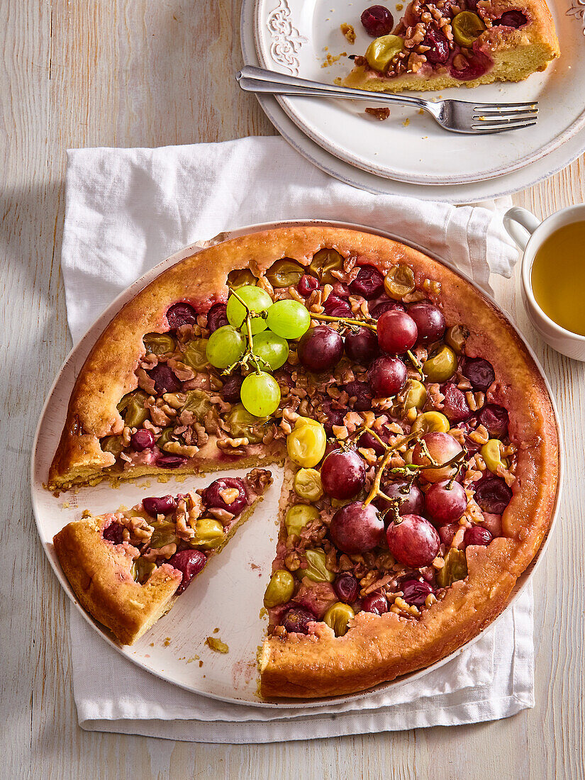 Tarte Tatin with wine grapes and nuts