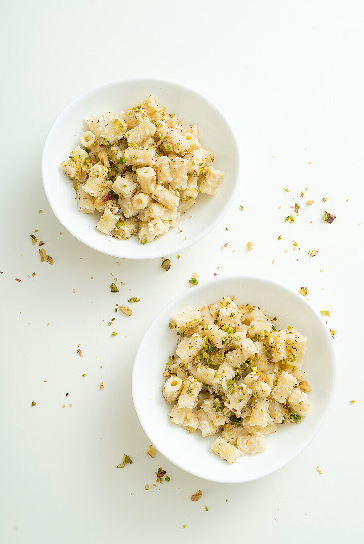 Tubetti pasta with pecorino, walnuts, pepper and pistachios