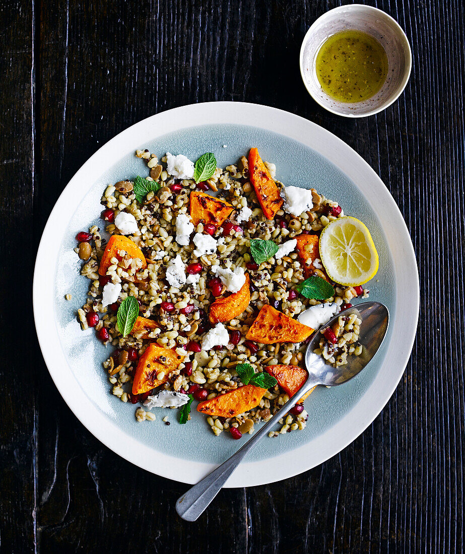 Roasted squash, grains and goat's cheese salad