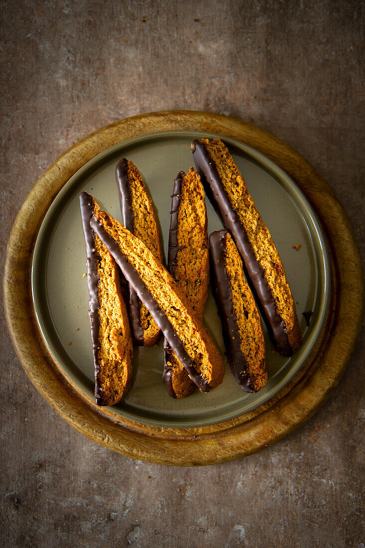 Vegan biscotti with linseed and chocolate icing