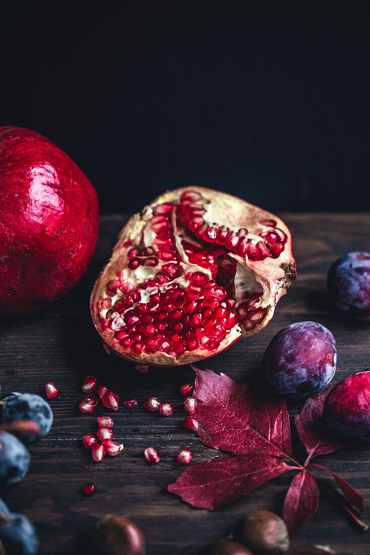 Pomegranate on a dark wooden background