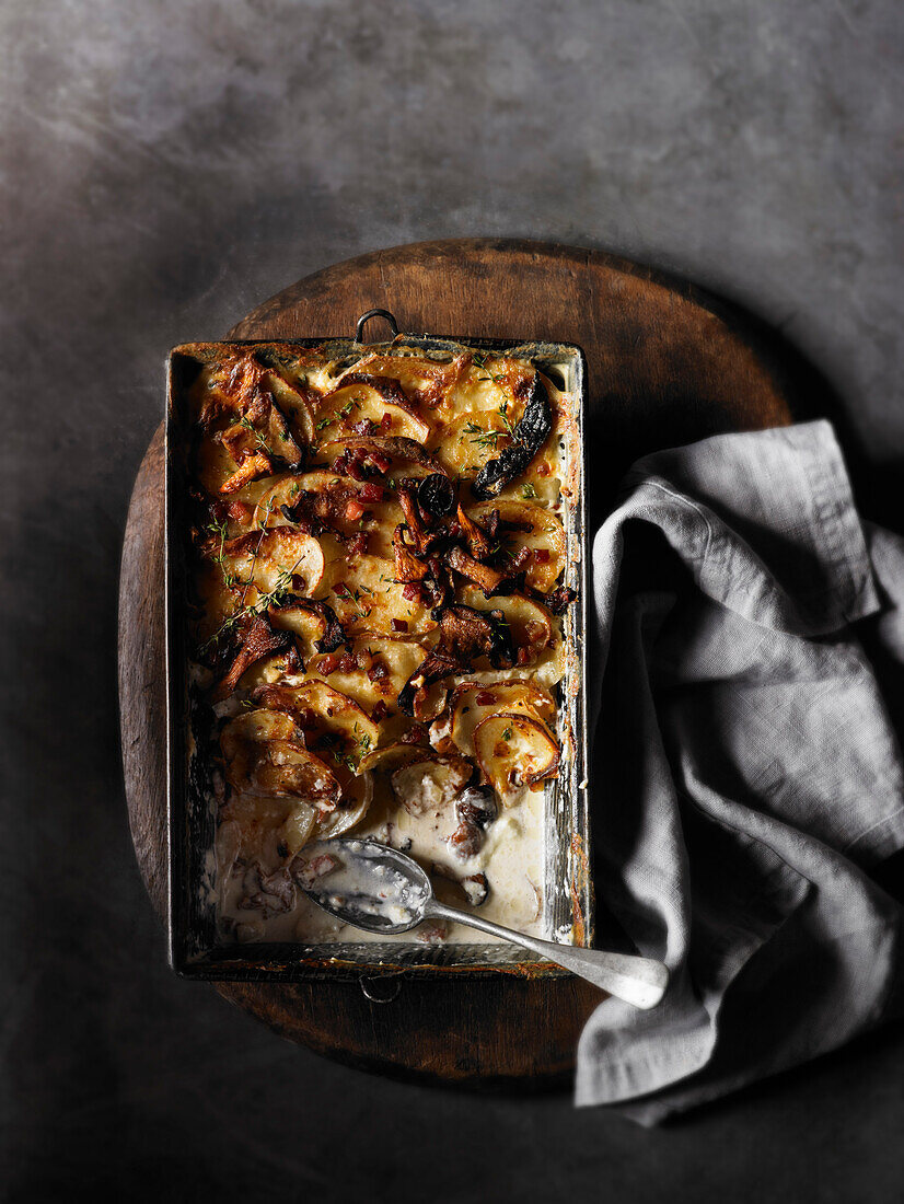 Mushroom, potato and pancetta gratin