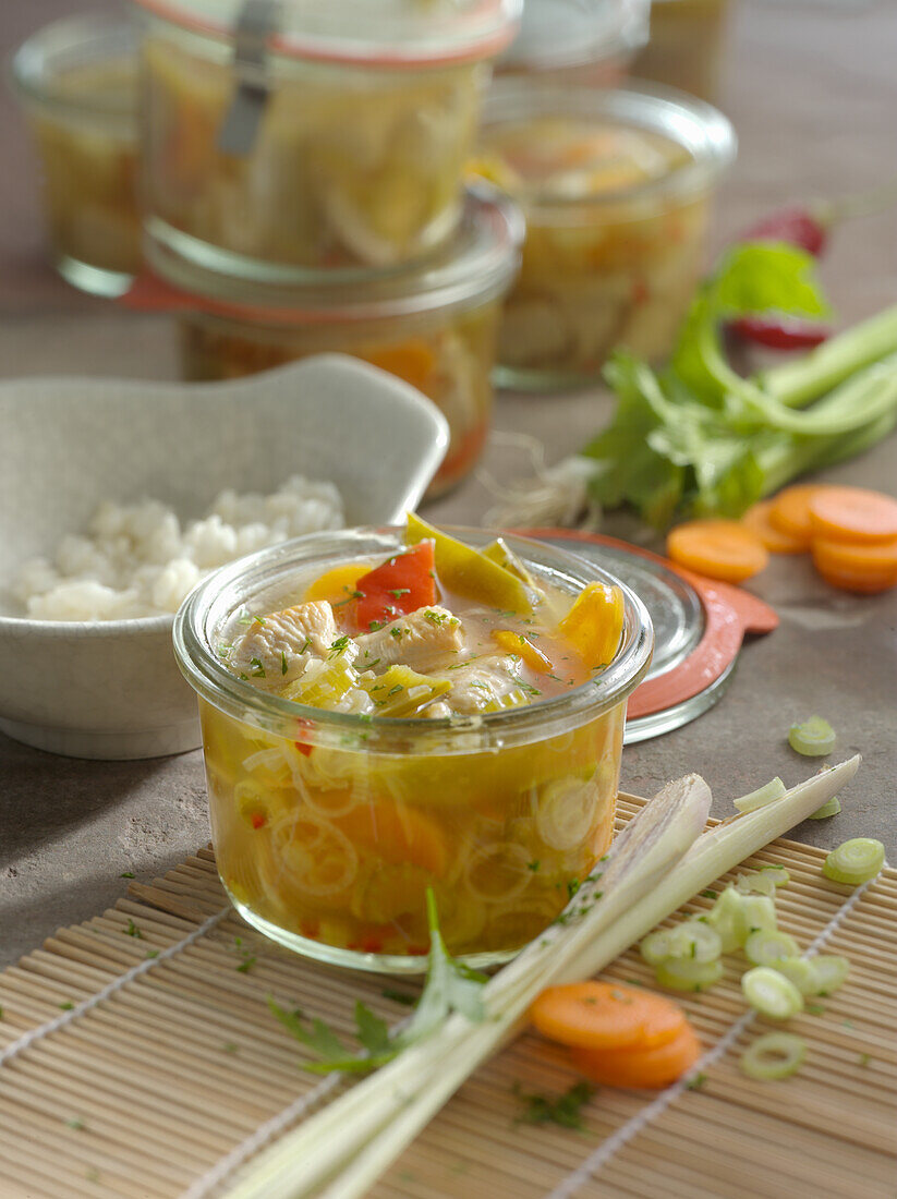 Preserved Asian chicken with vegetables in a jar