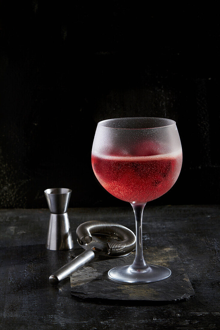 A hibiscus cocktail with gin