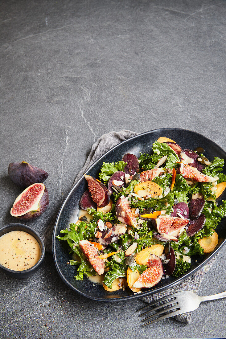 Kale salad with figs and apple miso dressing