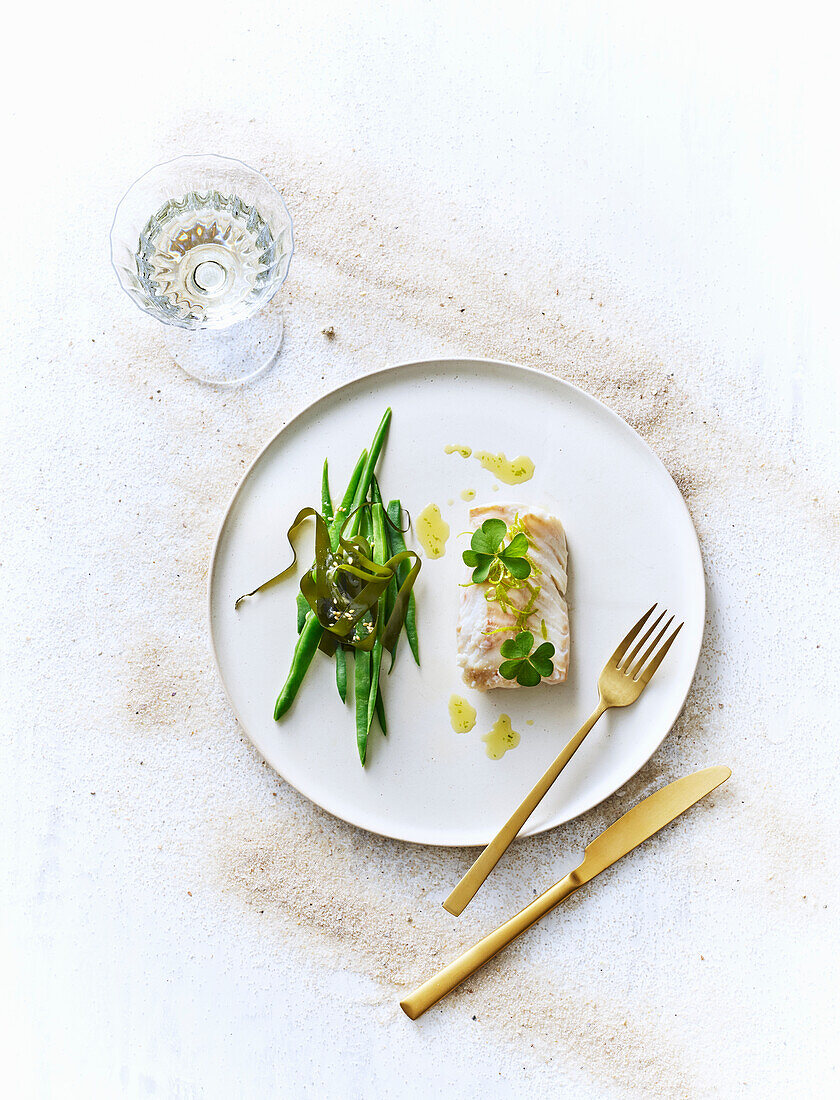 Poached cod with blanched beans and pickled seaweed