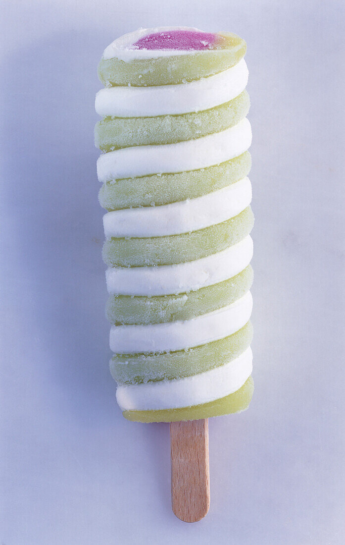 White and green Popsicle with a pink center