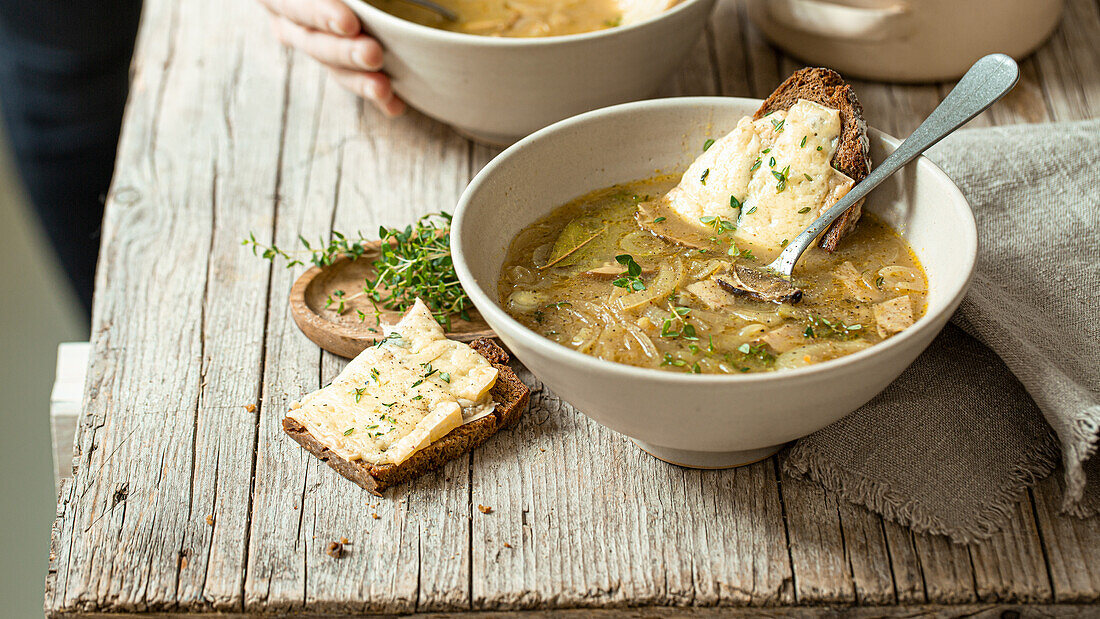 Onion soup with Camembert bread croutons