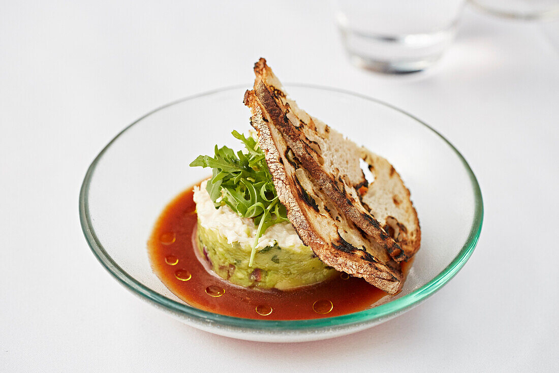 Crab and Guacamole served with a crisp sourdough