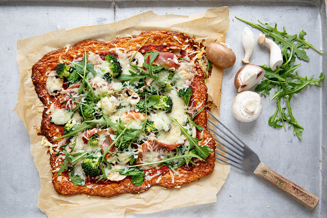 Curd dough (flatbread) pizza with mushrooms and rocket salad