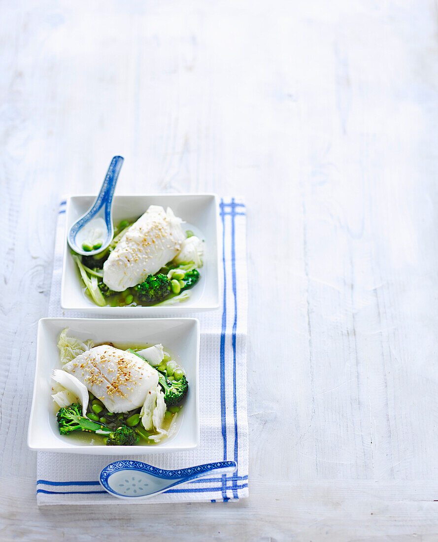 Poached fish with ginger and sesame broth