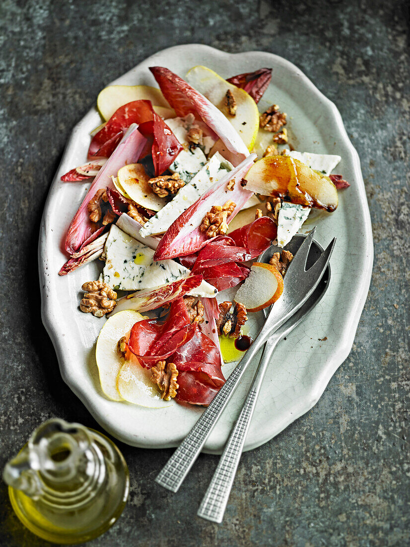 Shaved pear, cheese and bresaola salad