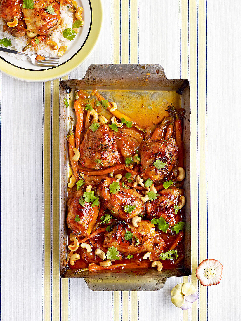Sticky citrus chicken with carrots and cashews