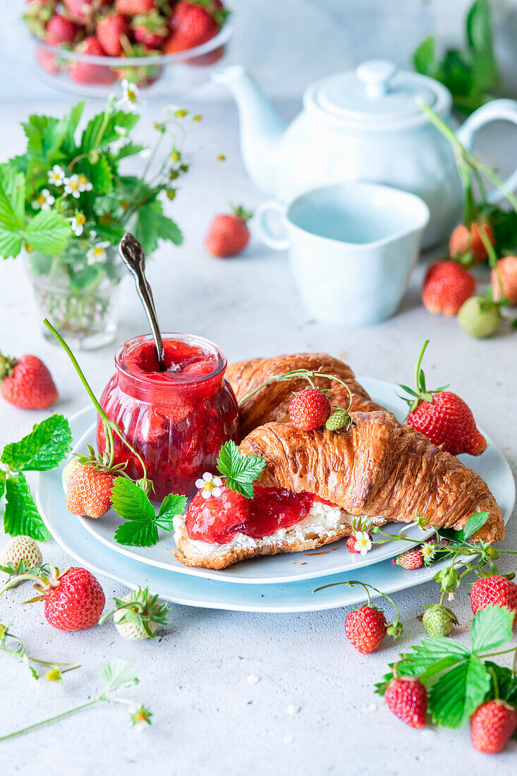 Strawberry jam with croissant and cream cheese