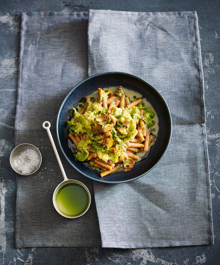Lentil pasta with savoy cabbage and chanterelles