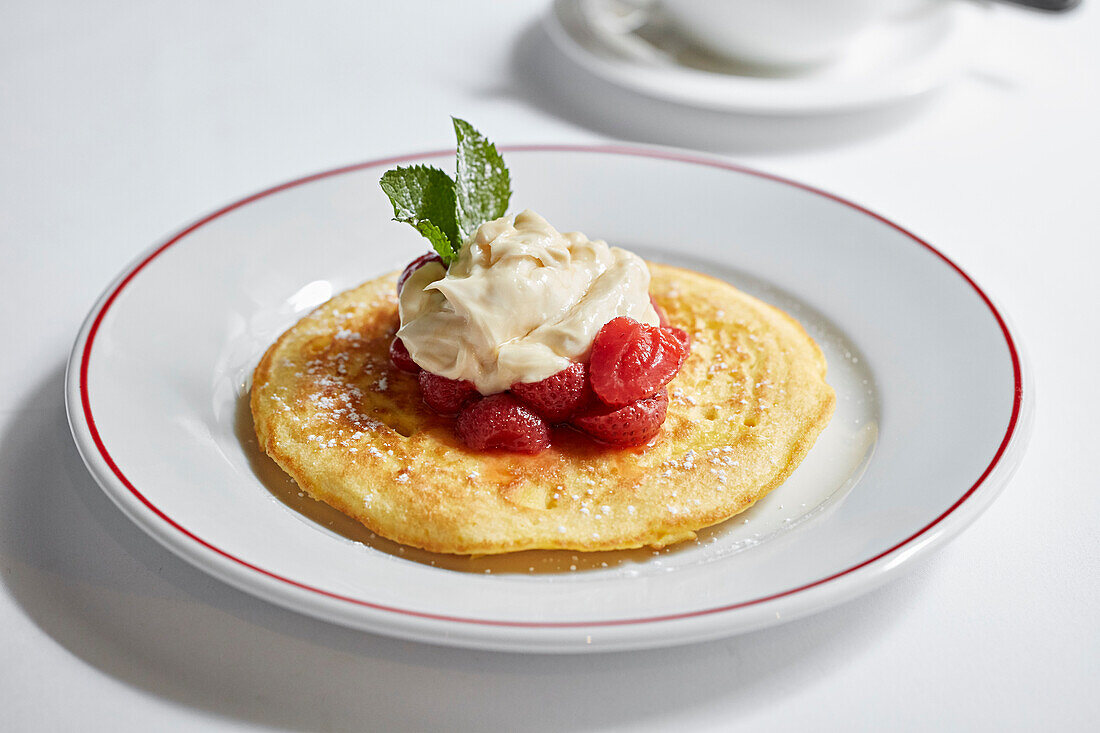 A pancake with strawberries and Creme Patissere