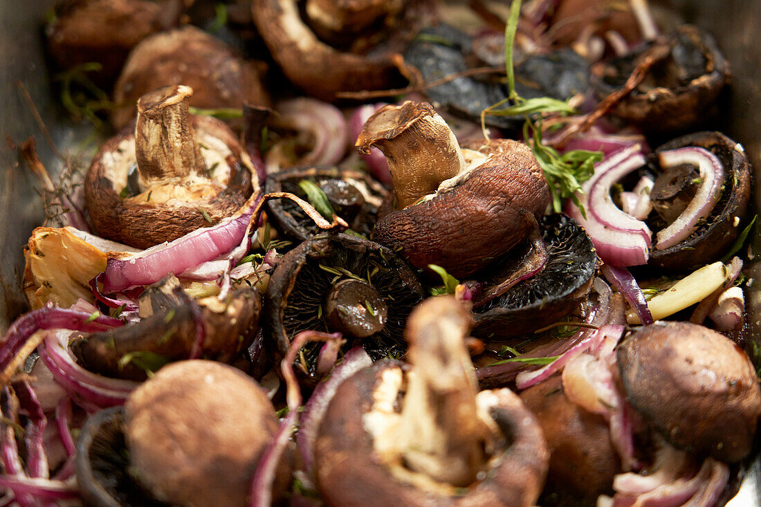 Fried Mushrooms with Red Onions and Herbs (Close Up)