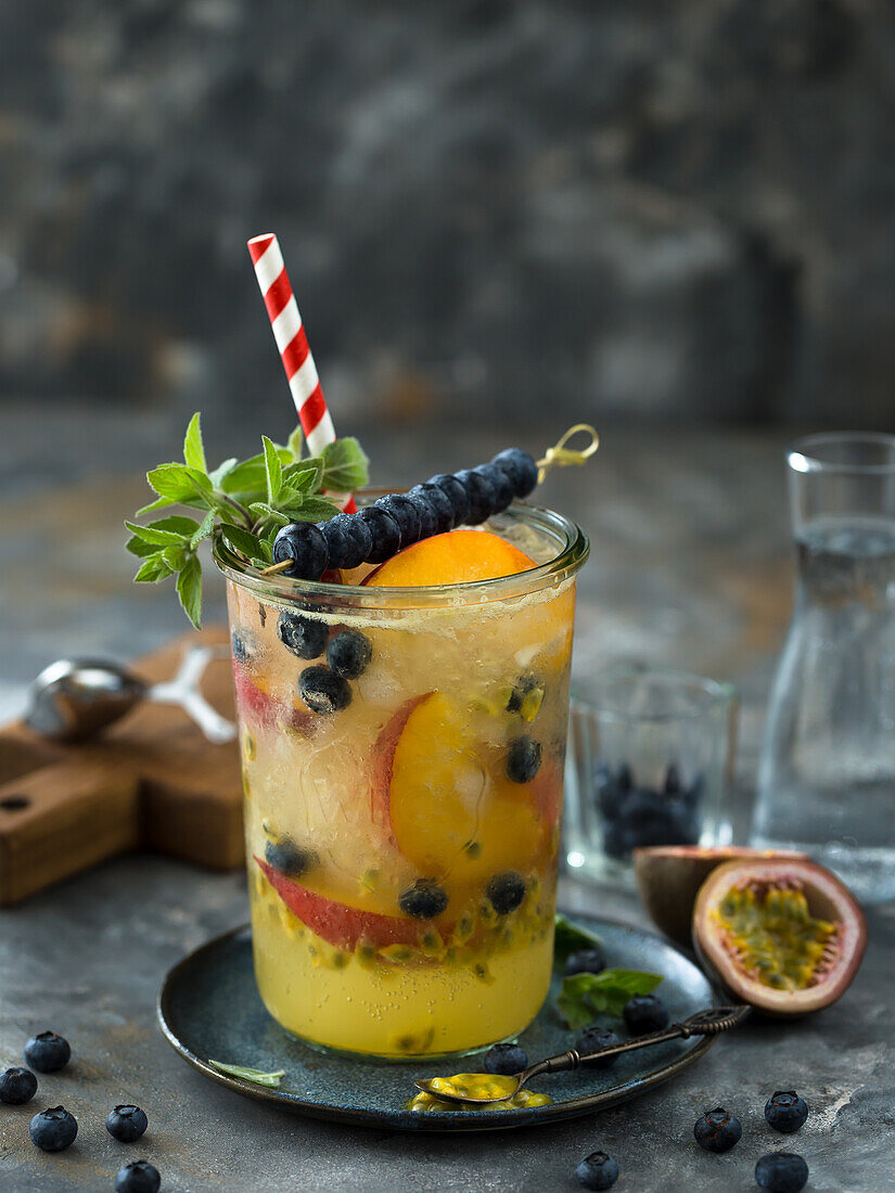 Summer lemonade with blueberries and peaches