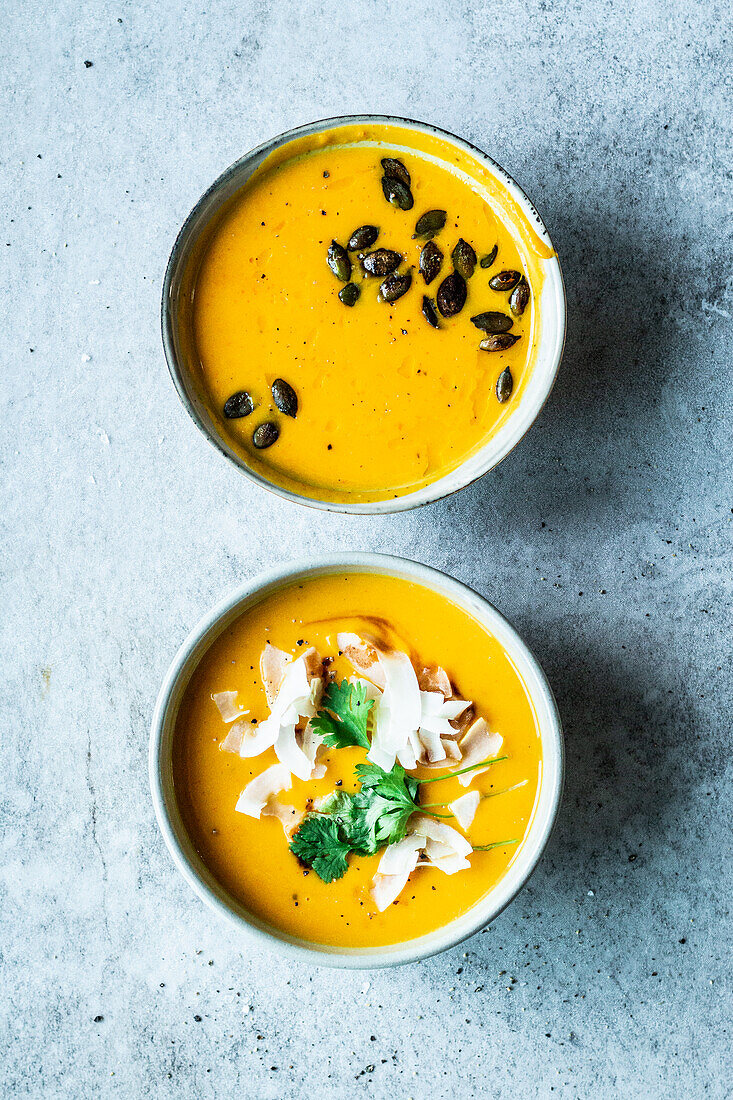 Classic pumpkin soup and pumpkin soup with coconut and harissa