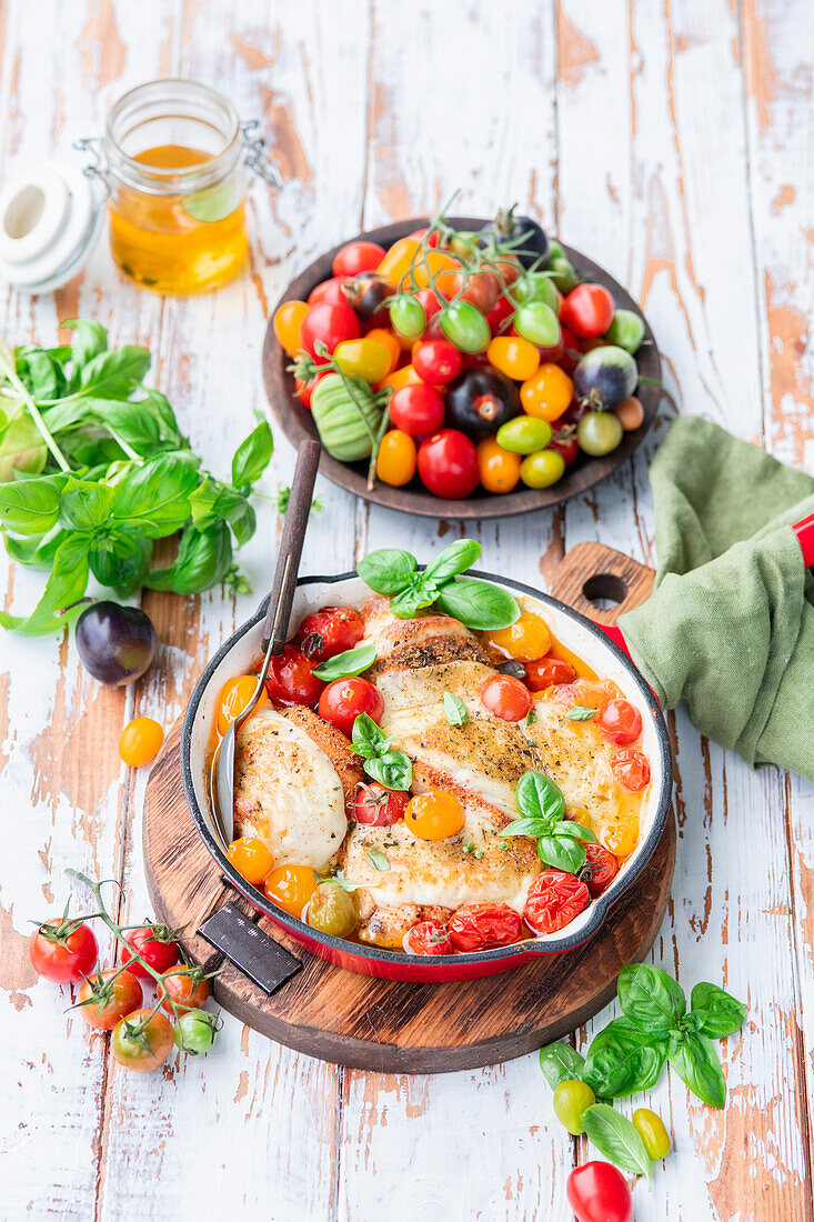 Roasted chicken with tomatoes and mozzarella