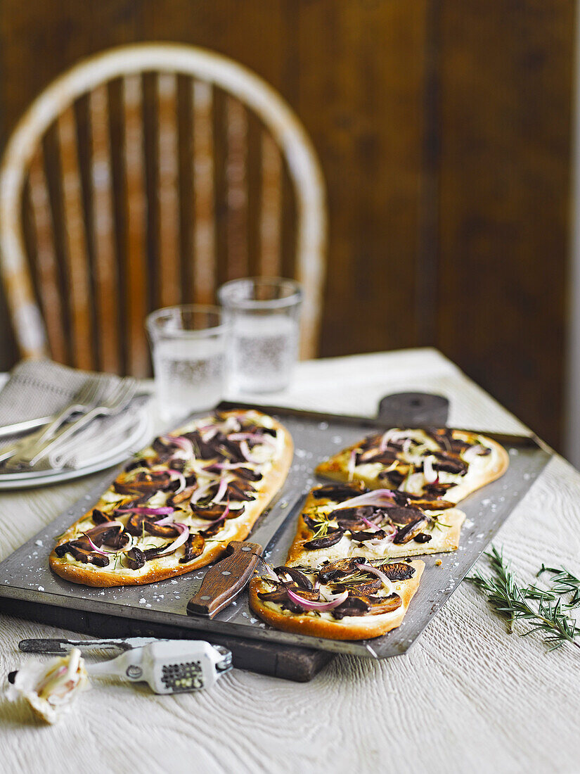 Tarte flambee with mushrooms and rosemary