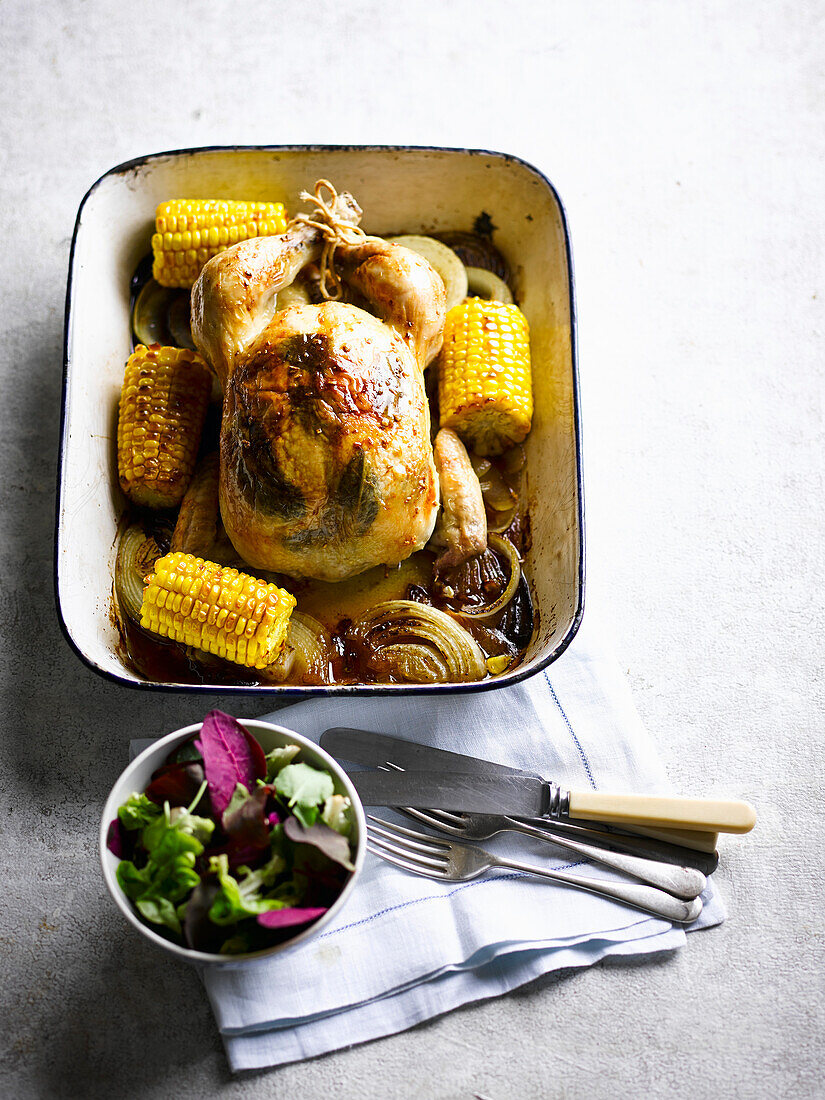 Golden roast chicken with corn, sage, and garlic