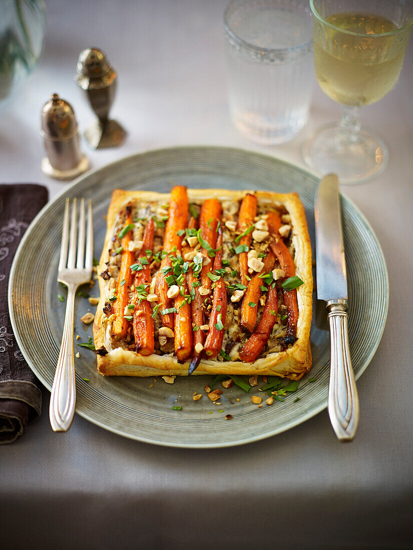 Golden-glazed carrot, mushroom and hazelnut tart