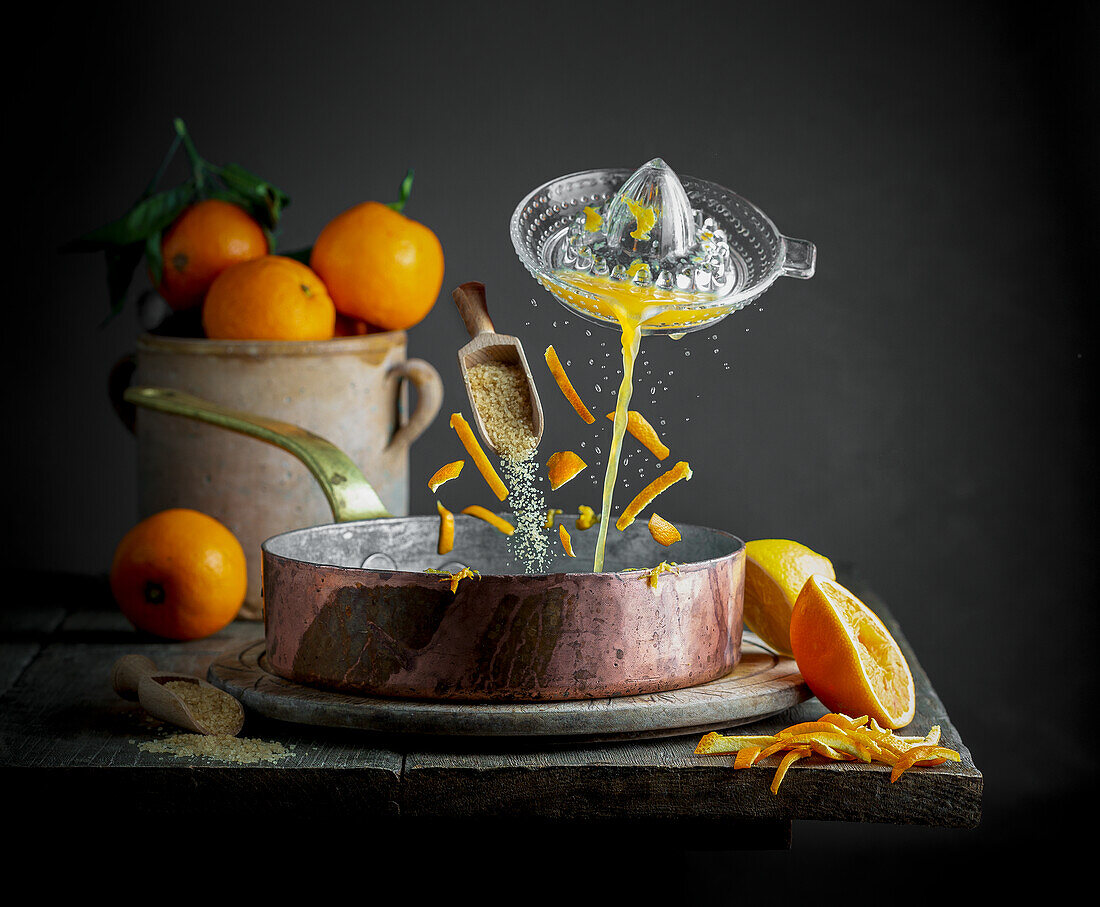 Floating ingredients for marmalade above a copper pot