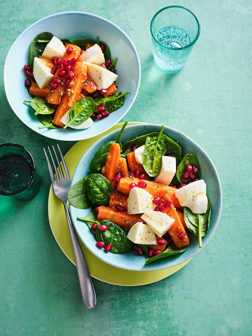 Carrot and spinach salad with mozzarella and pomegranate