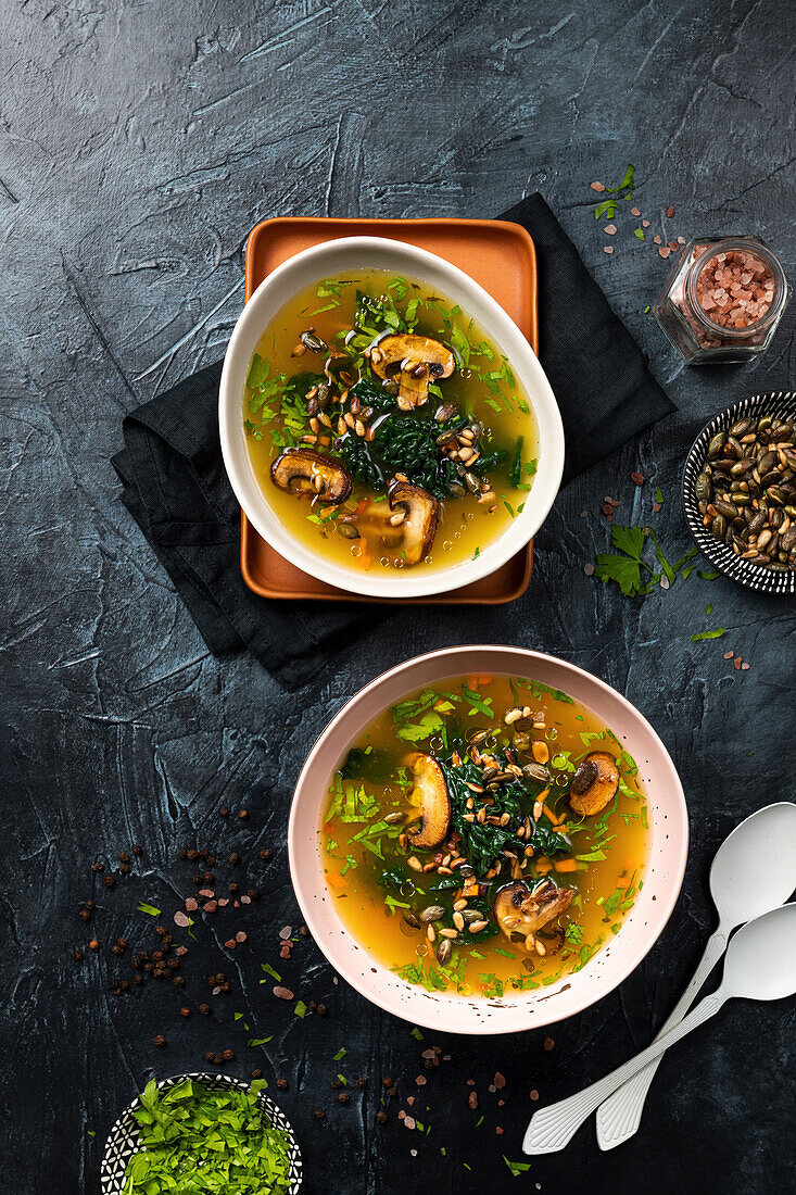 Vegan kale soup with mushrooms