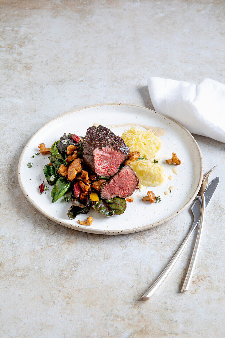 Beef medallions with mushrooms and celeriac cheese puree