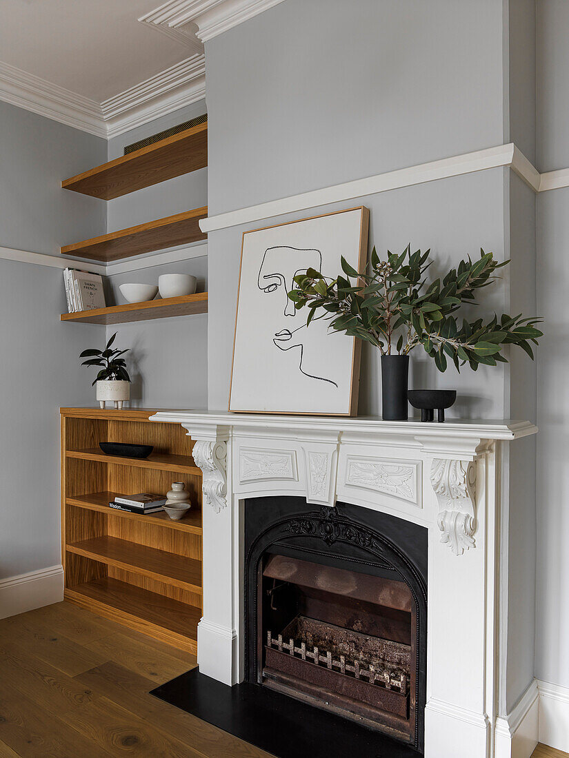 Bedroom with fireplace and grey walls